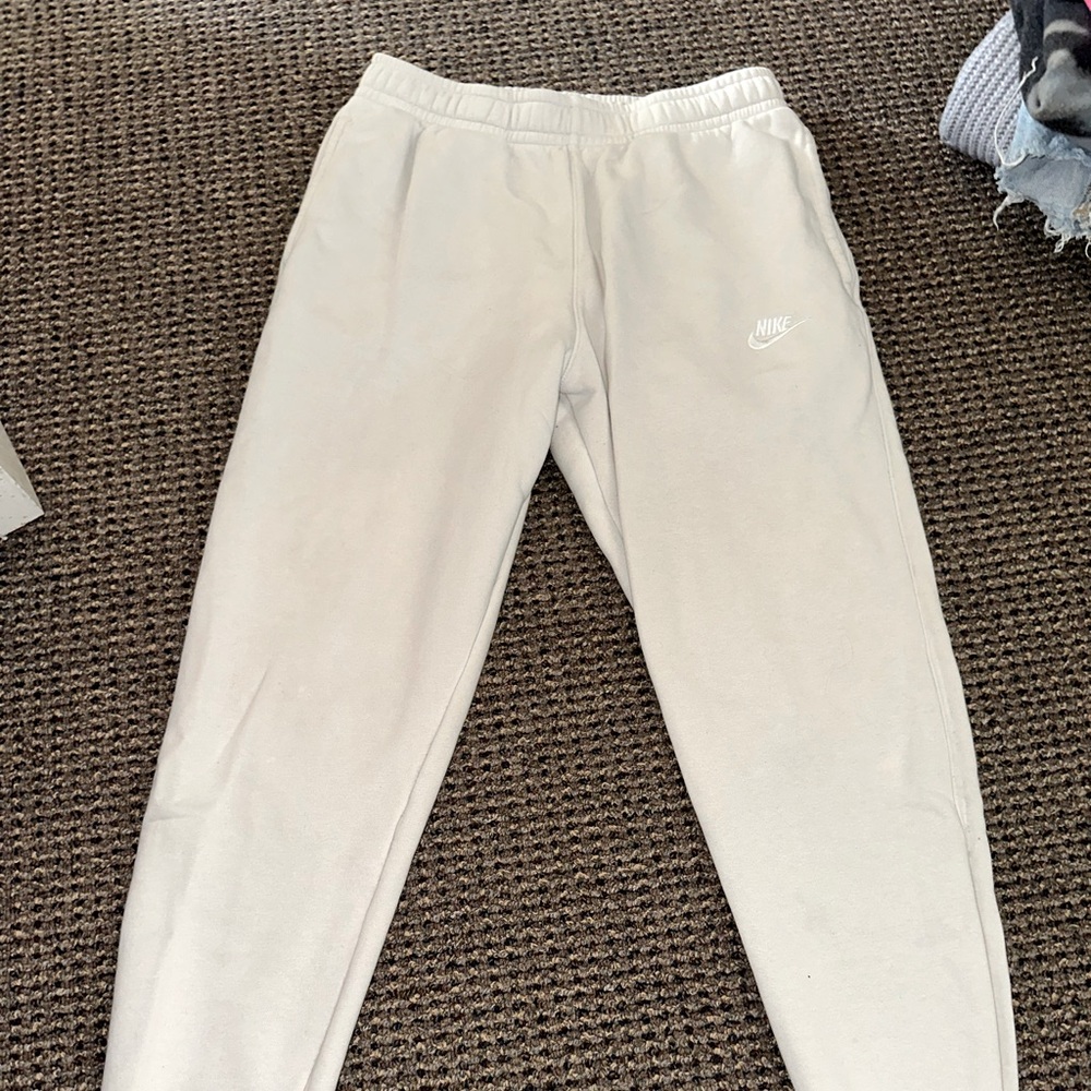 Cream nike joggers